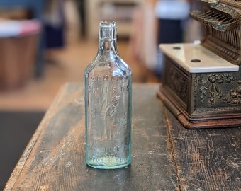 Bottiglia con rilievo dell'olio di fegato di merluzzo Scott's Emulsion degli anni '30, bottiglia medica, da collezione, pubblicitaria, rara, decorativa
