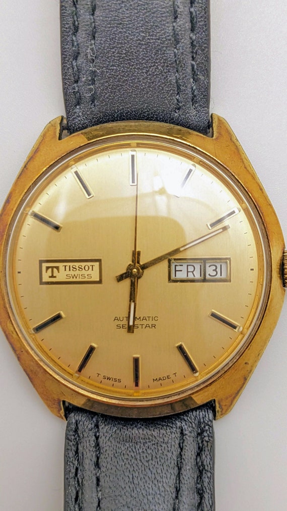 vintage tissot seastar automatic day date
