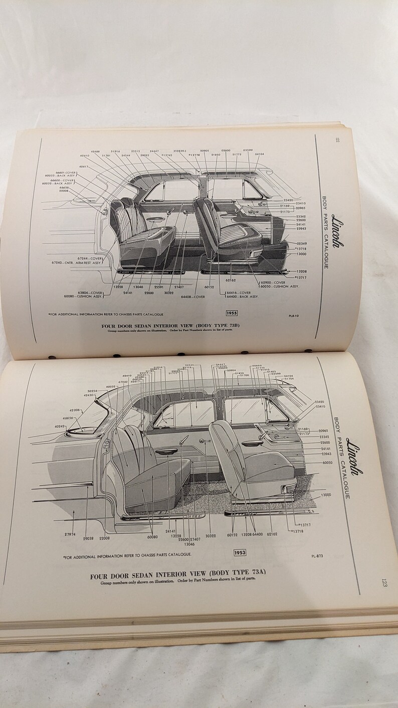 May include: A black and white diagram of a 1953 Lincoln four-door sedan interior. The diagram shows the location of various parts, including the seats, door panels, and window trim. The diagram is labeled with part numbers and descriptions.