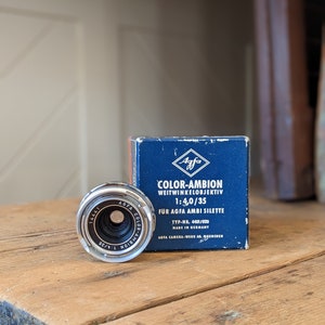 Objetivo vintage Agfa Color Ambion 1:40/35 con caja y estuche originales