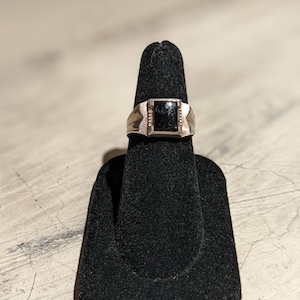 Sterling silver ring with black stone