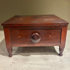 Early Paneled Countertop Cabinet with Turned Legs and Dovetailed Drawer