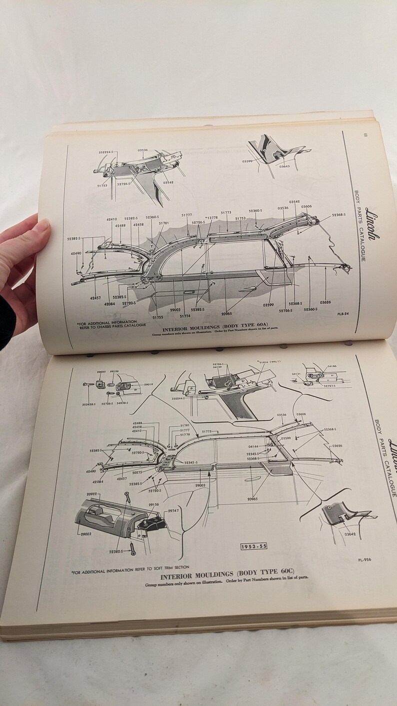May include: A black and white diagram showing the interior moldings for a 1953-55 Lincoln car. The diagram shows the placement of the moldings on the car's body, and includes part numbers for each molding.