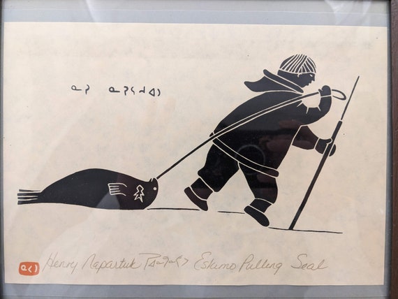 Kuujjuaraapik Signed Print by Henry Napartuk- Eskimo Pulling Seal