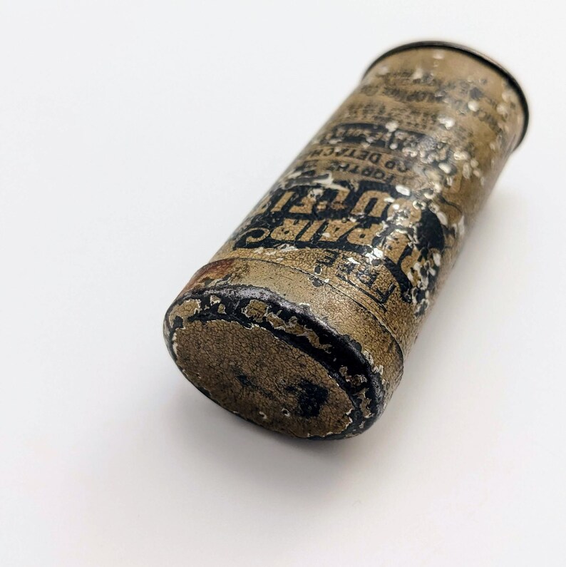 Lata antigua de equipo de reparación de neumáticos Dunlop – Publicidad automotriz imagen 7