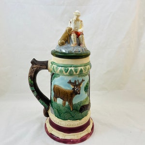Vintage grote keramische bierpul met deksel van hond en baasje