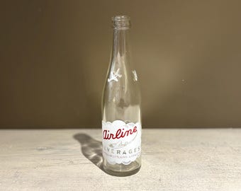 Botella de bebidas de aerolínea vintage United Bottlers Londres