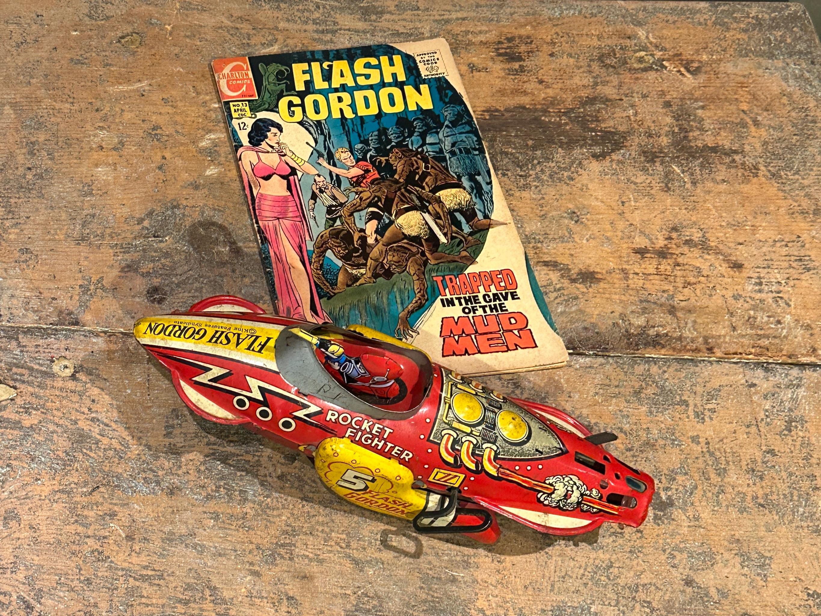 Juguete de cohete de cuerda Marx Flash Gordon Rocket Fighter vintage con comic original Etsy Mexico