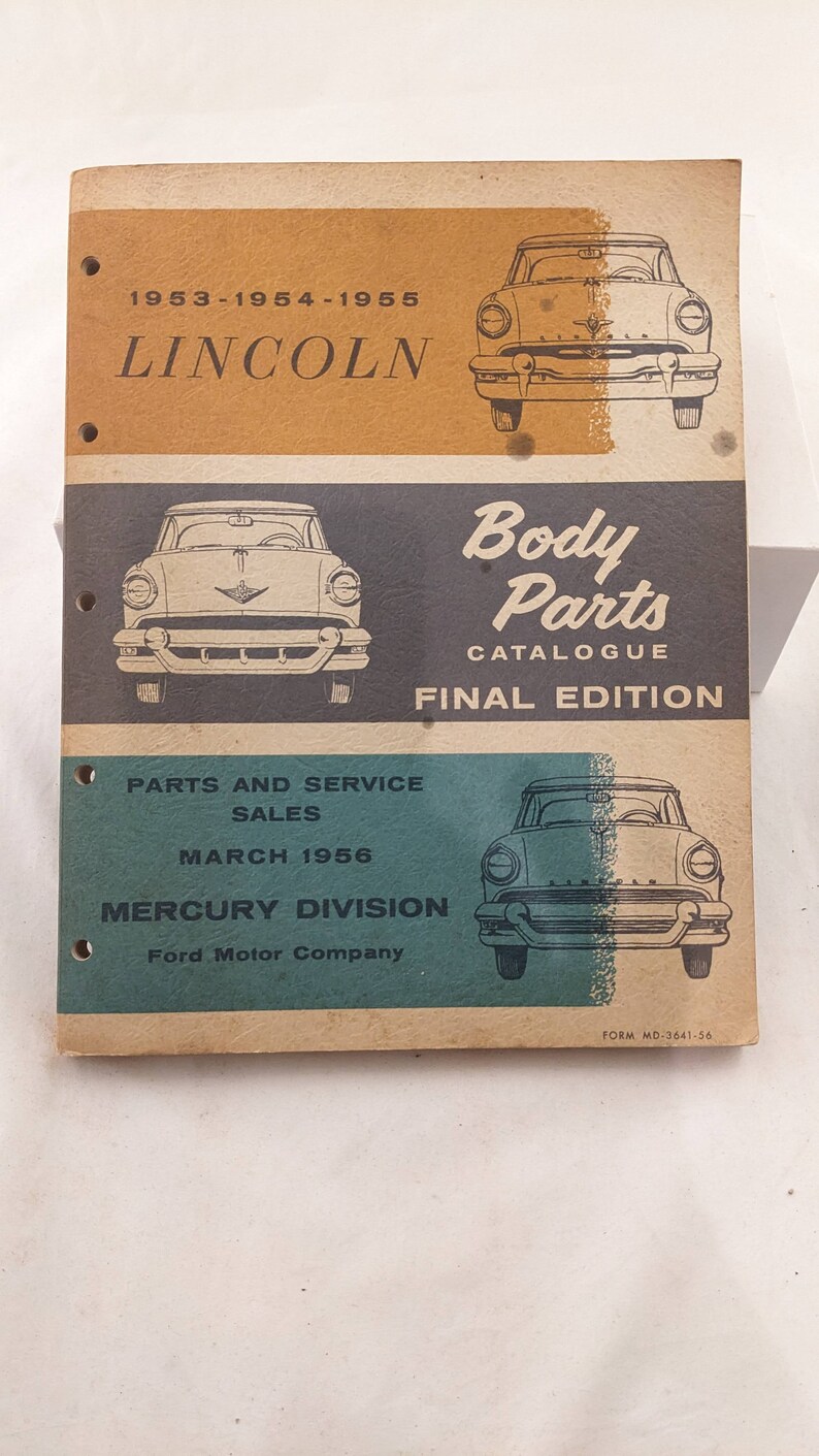 May include: A vintage brown and green booklet titled "Body Parts Catalogue Final Edition" for 1953-1955 Lincoln and Mercury car parts. The booklet features illustrations of the cars.