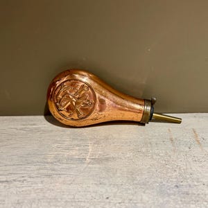 Vintage Copper Navy Powder Flask with Crossed Cannons and Boat Anchor Emblem