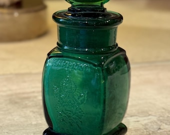 Frasco antiguo de sales aromáticas Harmony Boston color verde esmeralda con tapón ovalado repujado, circa 1880.