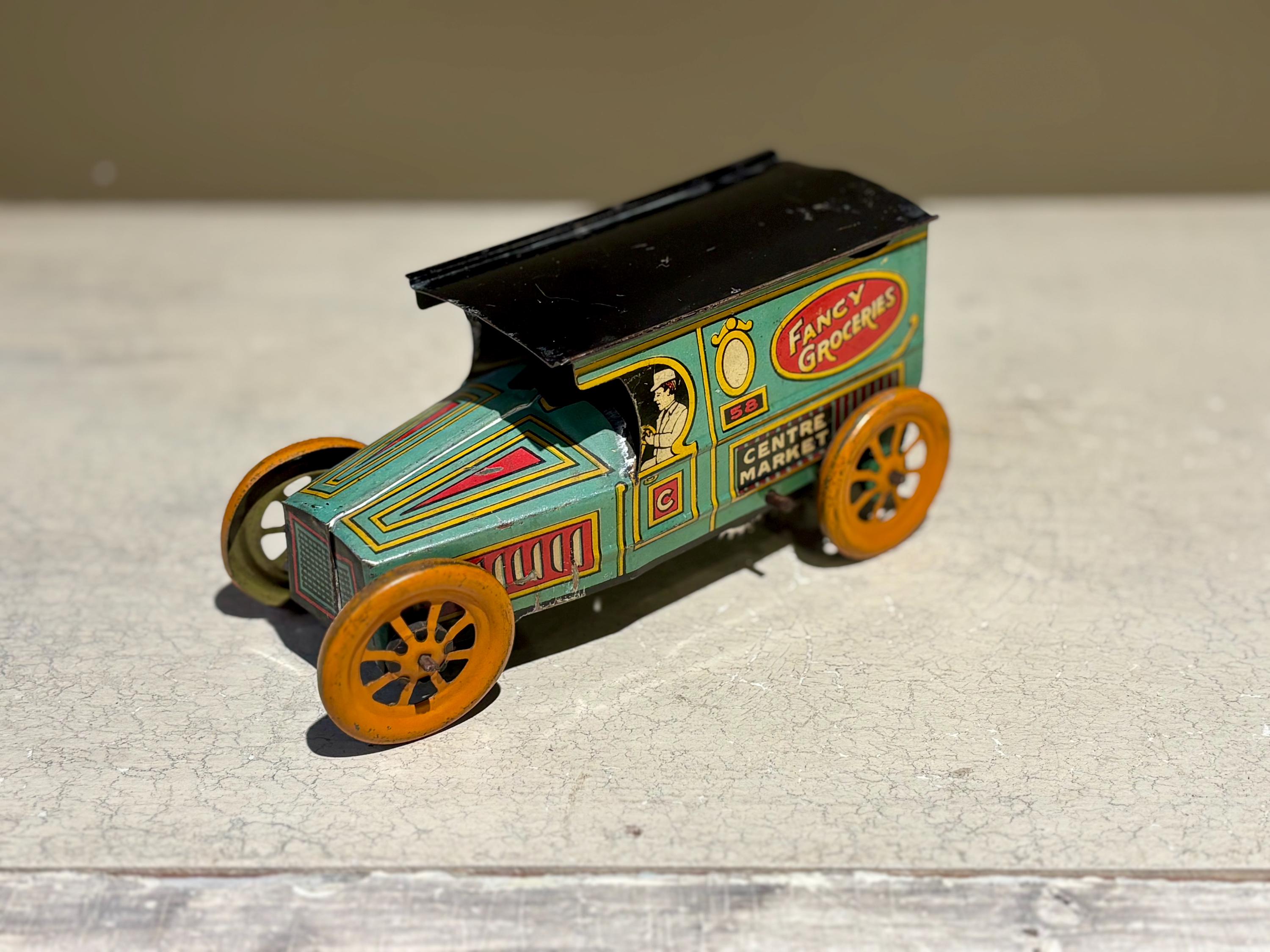 ヴィンテージ J. Chein ブリキ製ゼンマイ仕掛けの高級食料品おもちゃの