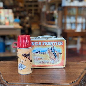 Fiambrera y termo vintage Ohio Art Wild Frontier