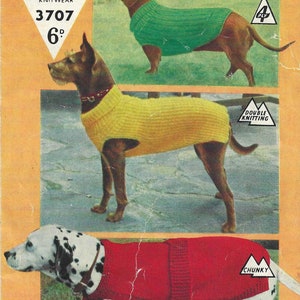 May include: Three dog sweater knitting patterns. The patterns include a green sweater for a dachshund, a yellow sweater for a Doberman Pinscher, and a red sweater for a Dalmatian. The patterns are labelled with the yarn weight: 4 ply, double knitting, and chunky.