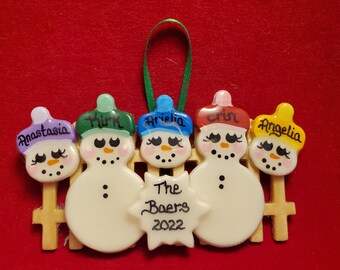 Snowman family standing by a fence personalized Christmas tree ornament with 2-6 snowmen- Baer Hands