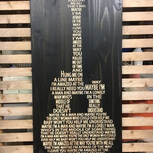 Maybe I'm Amazed by Paul McCartney Lyrics Carved in wood