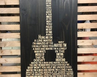 Maybe I'm Amazed by Paul McCartney Lyrics Carved in wood