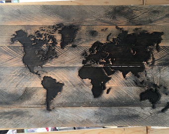 Reclaimed World Map Carved in wood 28x46in