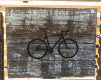 Bicycle silhouette carved in  wood