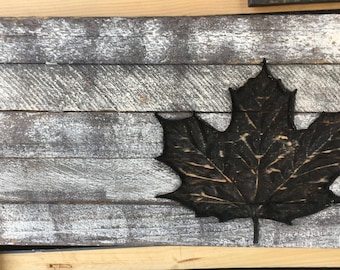 Reclaimed Maple leaf carved in wood