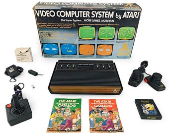 Atari 2600 ビデオゲーム、1978年製 Atari、6 Switch コンソール、オリジナルボックス入り、シリアル番号 81710167 付き。動作確認済み、モデル番号 CX-2600