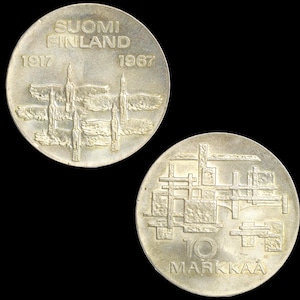 May include: A set of three ceramic mugs with a speckled, matte finish. The mugs are in shades of cream, light gray, and dark gray. Each mug has a simple, minimalist design, perfect for coffee or tea.