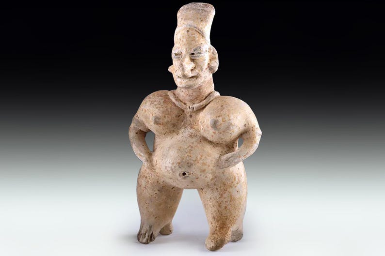 May include: A set of three ceramic vases in varying heights and shapes. The vases are glazed in a matte white finish, offering a minimalist aesthetic. The tallest vase is approximately 25 cm high.