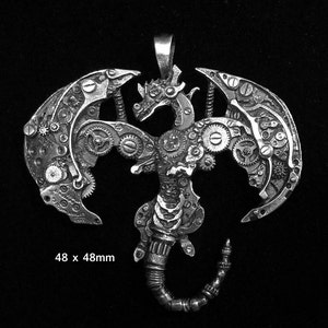 May include: A silver steampunk dragon pendant with intricate gears and cogs. The pendant is 48mm x 48mm.