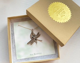 Dragonfly on a leaf in sterling silver