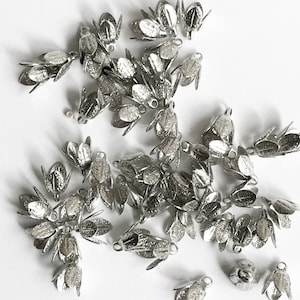 Leaf Bell Caps Bail Four Pliable Prongs. Loop for hanging. Silvertone Pack of 6
