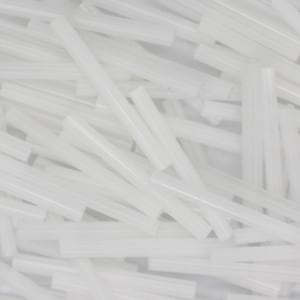 May include: A close-up image of a pile of white glue sticks. The glue sticks are all the same size and shape, and they are arranged in a random pattern.
