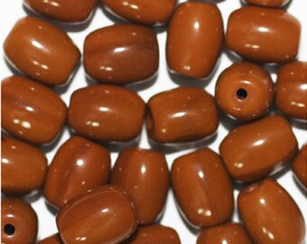 Brown Oval Checa presiona granos de cristal de 7mm (pack de 30)