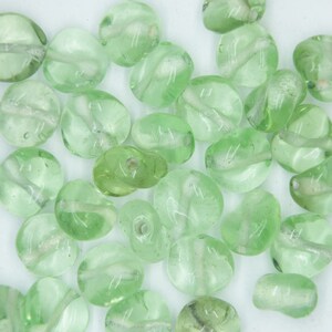 Glass Beads Pale Green Transparent Twist 10mm. Pack of 30. Made in India.