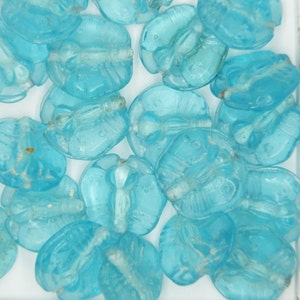 Glass Beads Light Blue Transparent Butterfly 14mm. Pack of 20. Made in India.
