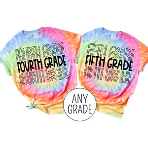 May include: Two tie-dye shirts with the text "FOURTH GRADE" and "FIFTH GRADE" in black. The shirts are rainbow colored with a white background. The text is in a retro font style. A white circle with the text "ANY GRADE" is in the bottom center of the image.