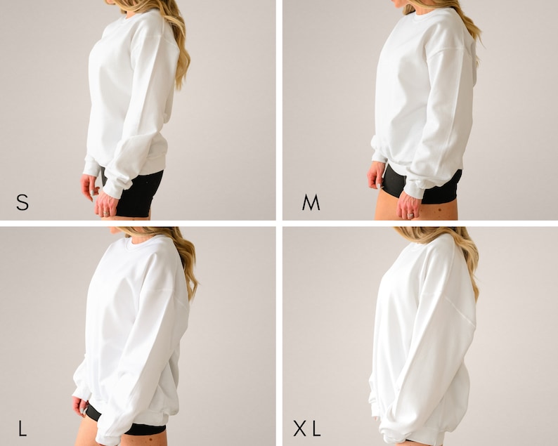 May include: Four images show a white sweatshirt in different sizes: S, M, L, and XL. The sweatshirts are plain, with a crew neck and long sleeves. The models are wearing black shorts.