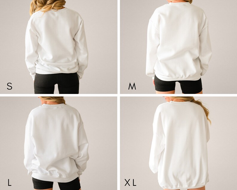May include: Four images showing a white sweatshirt in different sizes: S, M, L, and XL. The model is wearing black shorts and the sweatshirt is shown from the back.