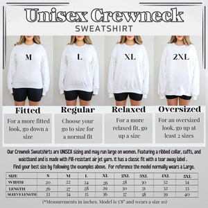 May include: Size chart for a unisex crewneck sweatshirt. The chart shows the width, length, and sleeve length in inches for sizes S through 5XL. The chart also includes a description of the fit for each size: fitted, regular, relaxed, and oversized.