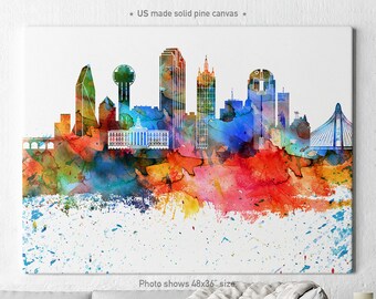 May include: A watercolour painting of the Dallas skyline with a colourful splatter effect. The skyline includes the Reunion Tower, the Bank of America Plaza, and the Margaret Hunt Hill Bridge. The painting is on a white background.