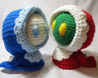 Crocheted Red and Pale Bonnetberry (baby tonberry) from World of Final Fantasy
