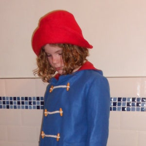 Blue Duffle Coat and Red Hat. World Book Day.