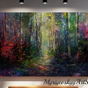 May include: Large, colourful forest landscape painting with a path leading into the distance. The artwork features vibrant hues of red, green, and purple, creating a sense of depth and light. The painting is displayed in a modern art gallery setting.