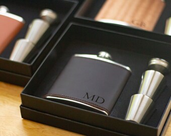 Personalized groomsman flasks, leather wrapped.
