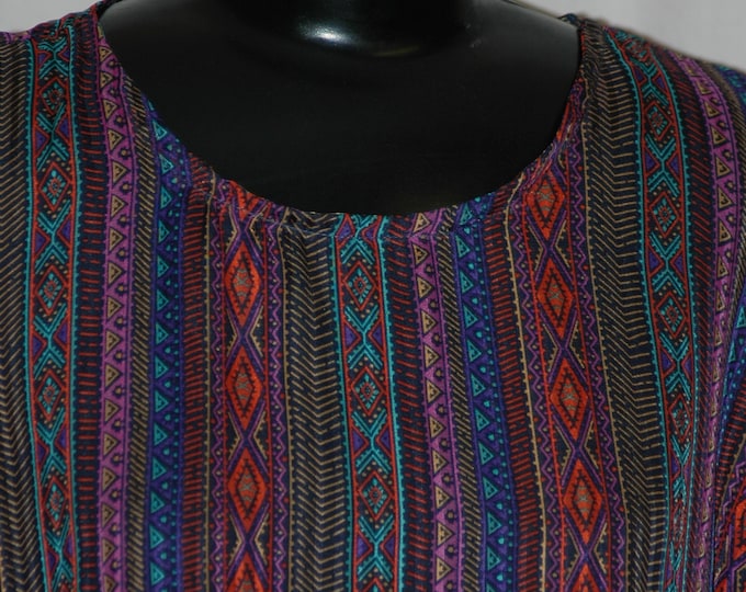 Featured listing image: Very floaty and abundantly airy poncho with hand strung beads on the cornors