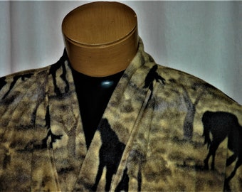 Camouflage like background with silouettes of horses on this velour anti-pill winter fleece robe with a generous wrap and calf length