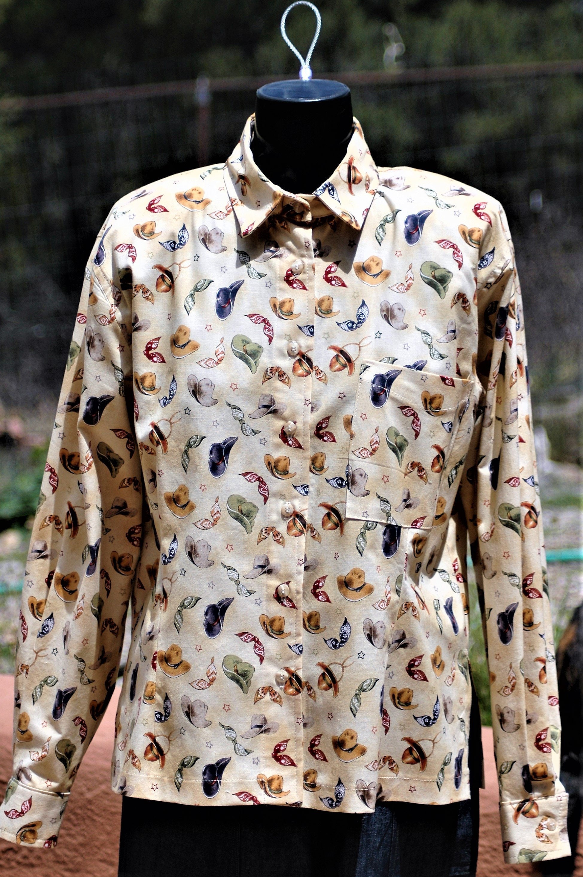 Long sleeve button down pre-washed cotton shirt with a western motif ...