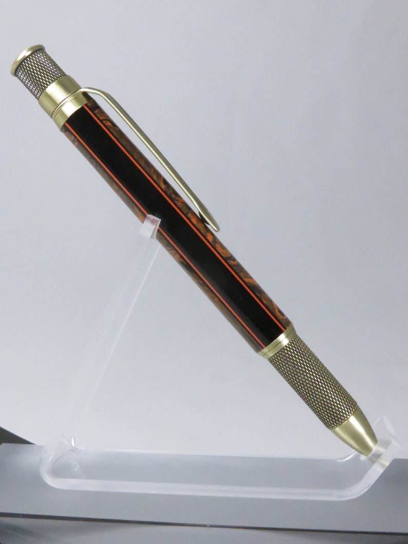 Knurl GT style accented in orange and black acrylic Item 201126 Ballpoint twist pen