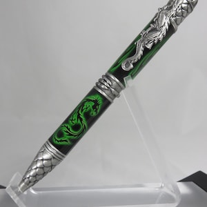 DRAGON THEME: Ballpoint twist pen in black acrylic with a green stylized Chinese dragon image and antique pewter hardware, my Item 105161