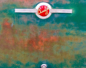 Vintage Buick V8 Logo on a Teal Weather Worn Trunk Lid