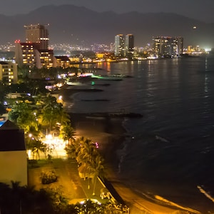 The Puerto Vallarta Mexico coastline at night from the 14th floor above the beach